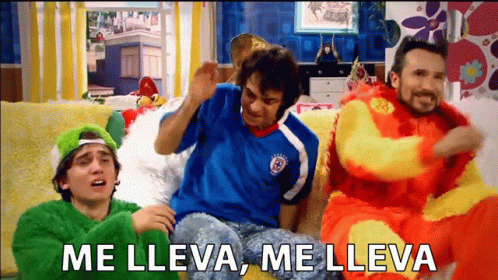 Three Men Sitting on Couch With Chile Shirt