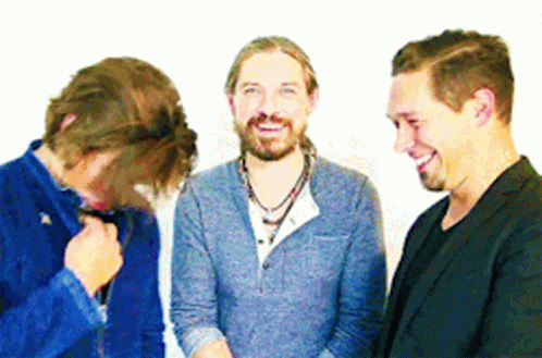 Three Men Smiling Together