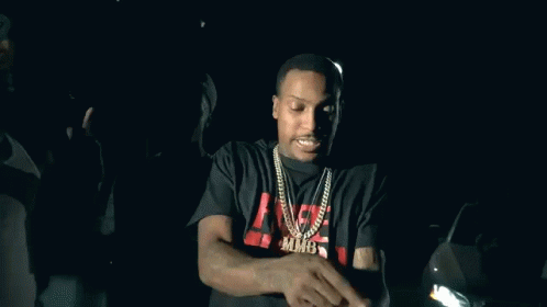 Three Men Standing In Dark Room GIF