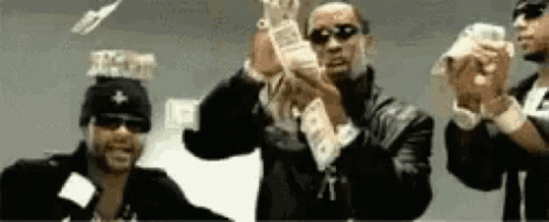 Three Men Throwing Money