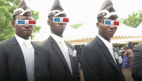 Three Men Wearing Coffin Hats And 3D Glasses Stand In A Line GIF