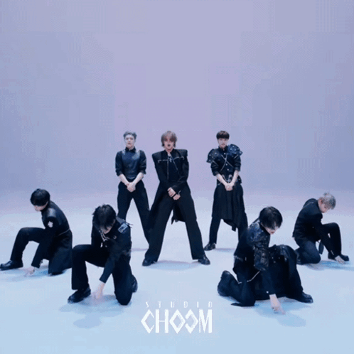 Three People Dancing at Studio Choom Sign