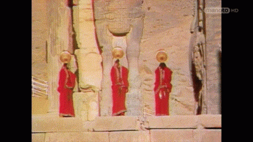 Three People in Red Robes with Asiantoto HD
