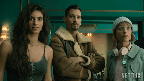 Three People Standing Next To Each Other With A Netflix Logo On The Bottom GIF