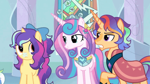 Three Ponies Standing Together One With Unicorn Horn