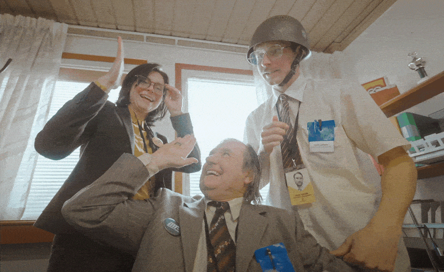Three Professionals High Five Collaboration GIF