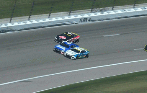 Three Race Cars On Track With TLrv 4 Barrier GIF
