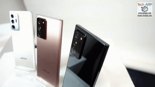 Three Samsung Phones Are Displayed On A Table With A Tech Arp Logo In The Corner GIF