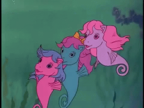 Three Seahorses Swimming