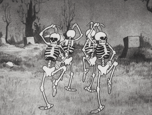 Three Skeletons Dancing in Cemetery