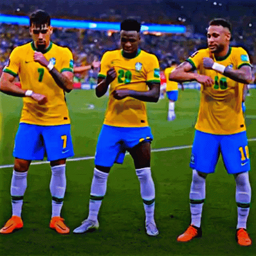 three soccer players are standing on a field with one wearing the number 7