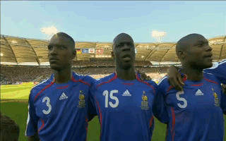 Three Soccer Players In Blue Jerseys Numbers 3 15 5 GIF