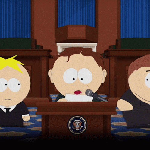 Three South Park Characters Are Sitting At A Podium With The Seal Of The President GIF