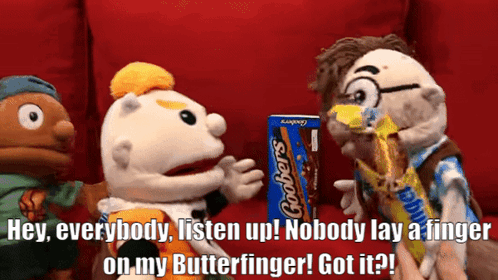 three stuffed animals are standing around a box of grobers chocolate bars