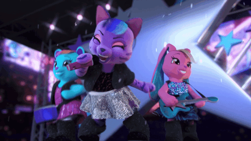 three stuffed animals on a stage with one holding a microphone and one holding a guitar