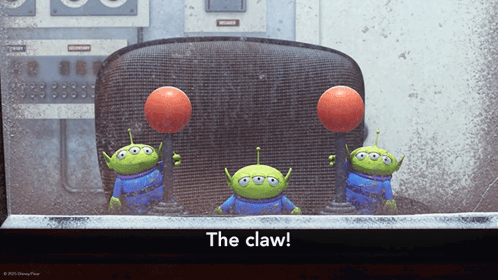 Three Toy Story Aliens Are Holding Balls In Their Hands With The Caption The Claw GIF