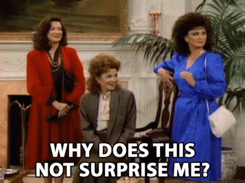 Three Women Are Standing In A Living Room And One Of Them Is Asking Why Does This Not Surprise Me GIF