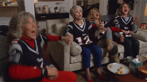Three Women In Patriots Jerseys Sitting GIF