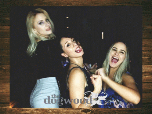 Three Women Posing With Dogwood