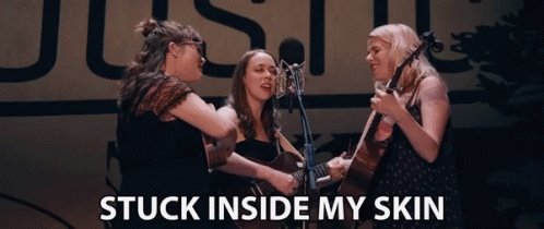 Three Women Singing and Playing Guitars Stuck Inside My Skin