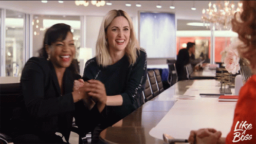 Three Women Sitting At A Table With The Words Like A Boss On The Bottom Right GIF
