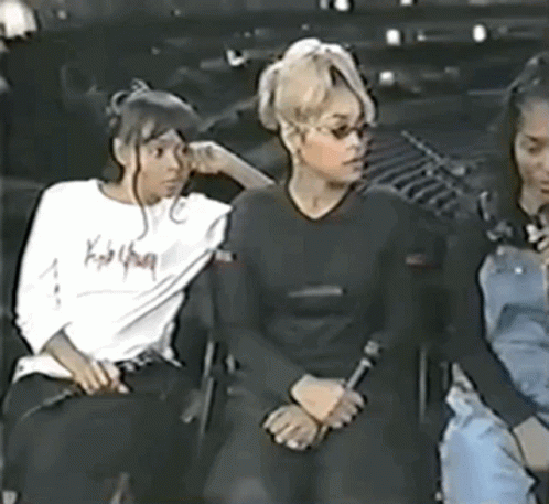 Three Women Sitting Together GIF