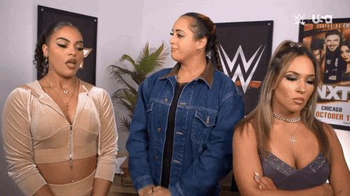 Three Women Standing by NXT Poster