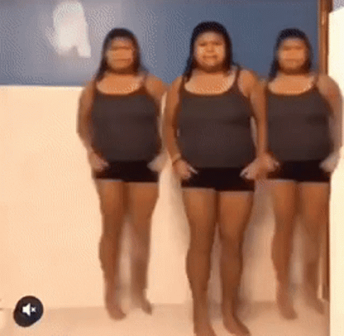 Three Women Standing Next to Each Other