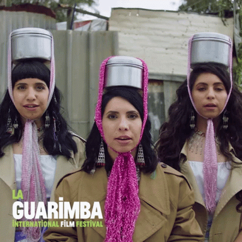 Three Women Wearing Pots On Heads Guarimba International Film Festival GIF