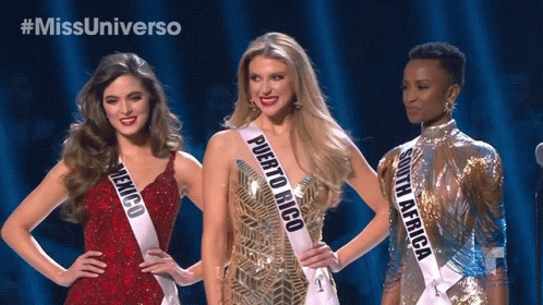 Three Women With Sashes for Puerto Rico Mexico South Africa on Stage