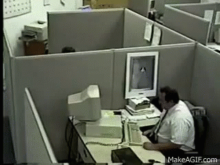Angry Employee Throwing Computer GIF