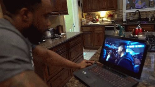 Angry Man Throwing Computer GIF