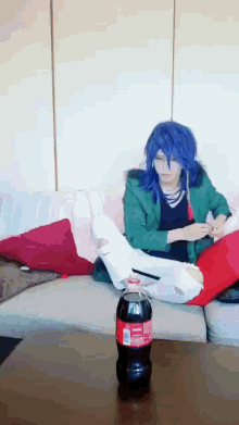 Throwing Mentos To Coke Bottle GIF