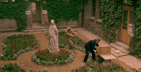Throwing Papers At The Garden GIF
