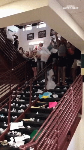 Throwing Papers At The Stairs GIF