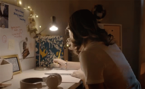 Throwing Papers While Studying GIF