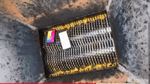 Throwing Phone Into The Shredder GIF