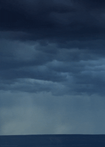 Sudden Thunderstorm On Calm Waters GIF
