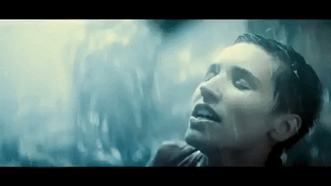 Woman In Forest During Thunderstorm GIF