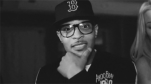 Ti Does Wide Grin Turned Laugh GIF