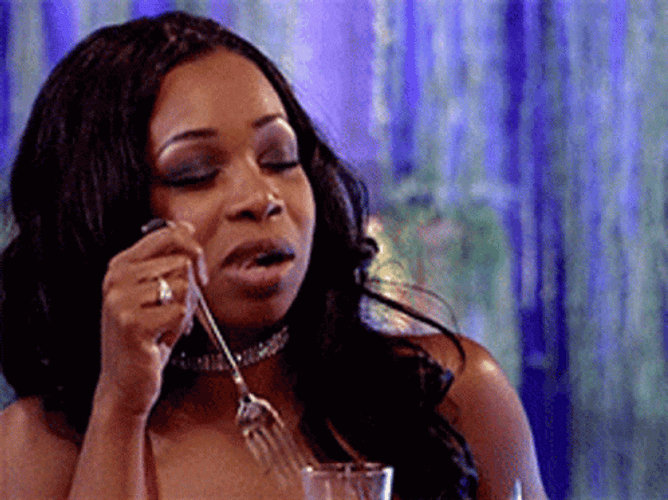 Tiffany Pollard Eating Wielding Steak Knife  GIF