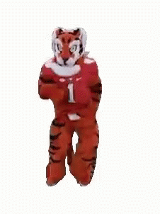 Tiger Mascot Dancing With Arms Outstretched