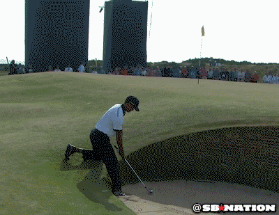 Tiger Woods Trying A Burried Strike GIF