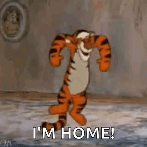 Tigger From Winnie The Pooh Is Dancing In A Room With The Words `` I 'M Home '' . GIF