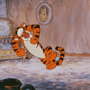 tigger from winnie the pooh is sitting on the floor