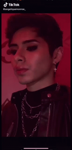 TikTok Video of Woman Face With Blue Background