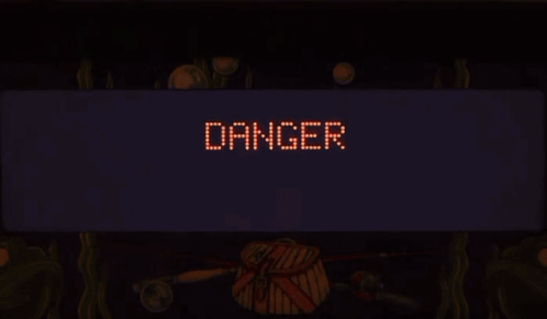 Tilt Sign Lit Up in Dark Room
