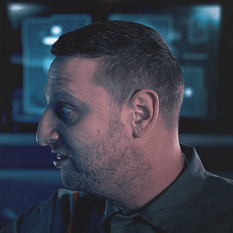 Tim Robinson Stunned Reaction Head Tilt GIF
