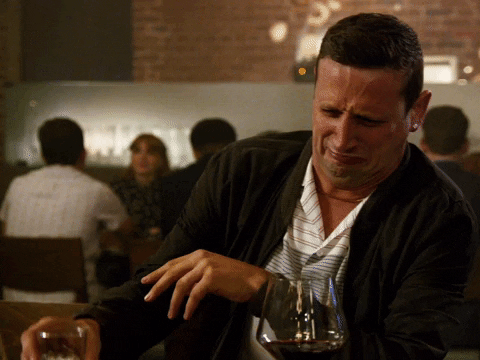 Tim Robinson Wafting Smell Disgusted Face GIF