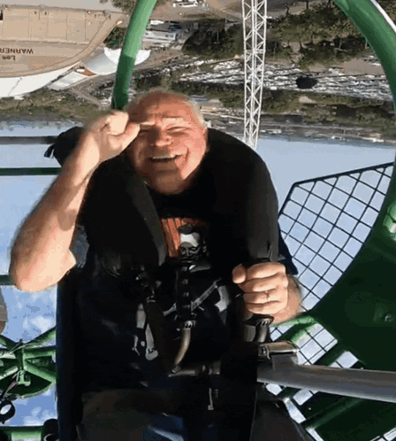 Tim Walz Riding Amusement Park Ride GIF